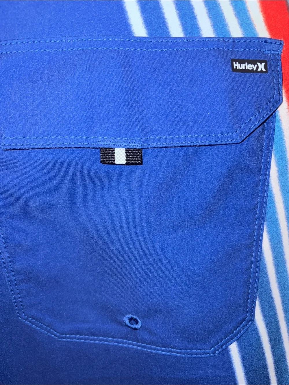 Hurley Red Boardshorts with Blue & White Side Stripes